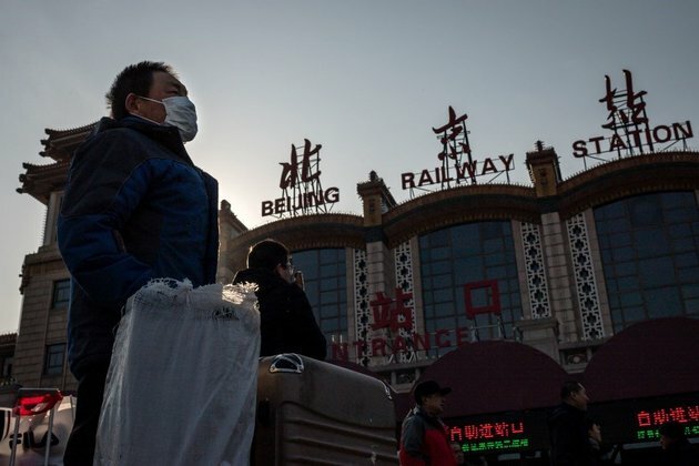 China says virus spreading between humans as WHO set to meet