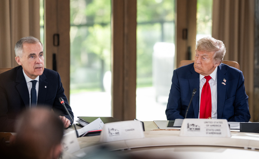US President Donald Trump and Canadian Prime Minister Mark Carney at the G7 Summit in Alberta, Canada on June 16, 2025.