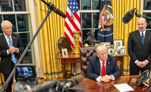 US President Donald Trump signs executive orders on February 10, 2025, in the Oval Office