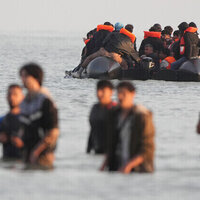 Child migrants arriving in UK revealed to be adults  Sun