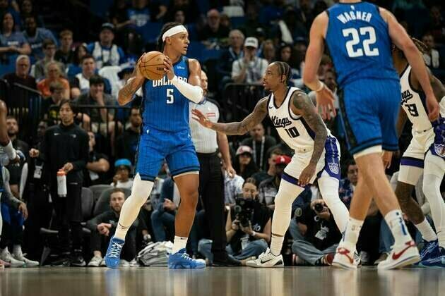 Hot shooting, stifling defense carry Magic over Kings