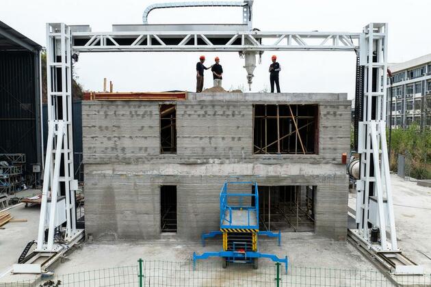 GLOBALink | 3D Printing erects two-story building in just 22 days