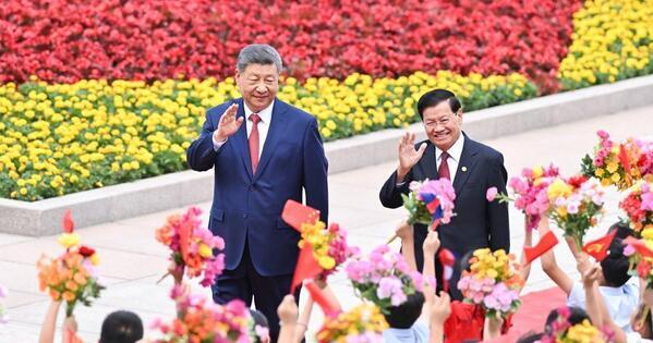 Xi's Album | Chinese, Lao top leaders hold talks in Beijing