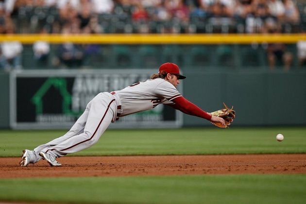 Rockies outslug Diamondbacks, 11-7