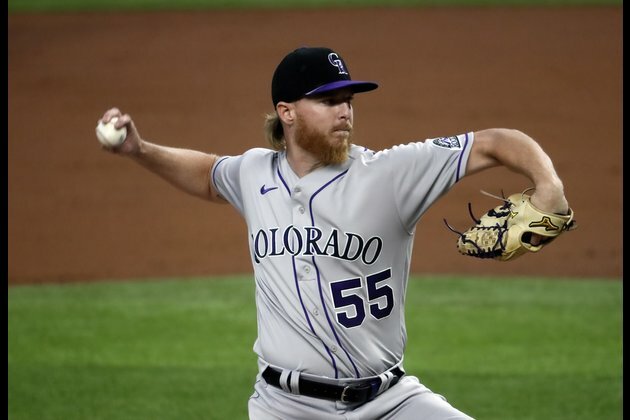 Surprising Padres visit hot Rockies in Coors opener