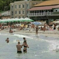 Exhausted By War, Ukrainians Seek Respite On Odesas Beaches