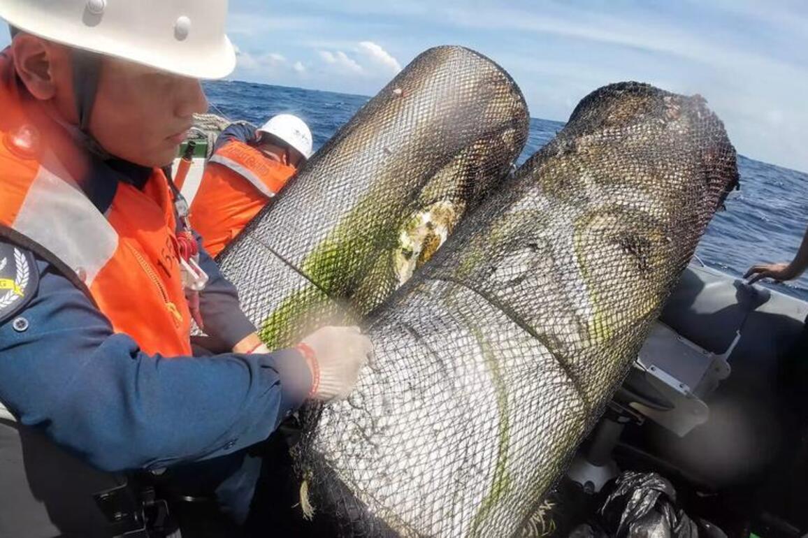 InPics | Illegally planted fish traps dismantled by China Coast Guard vessel in South China Sea