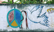  Peace mural painted on a wall in Dili, by Damon Evans