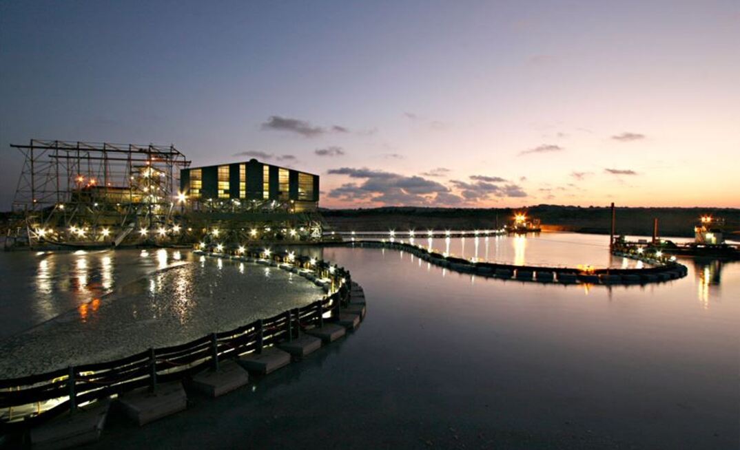 The wet concentrator plant and dredges operating at night at Moma