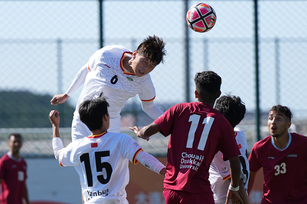 (SP)CHINA-DALIAN-FOOTBALL-FISU UNIVERSITY WORLD CUP-MAR VS CHN (CN)