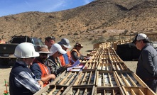 Technical team inspecting core at the Cortadera project