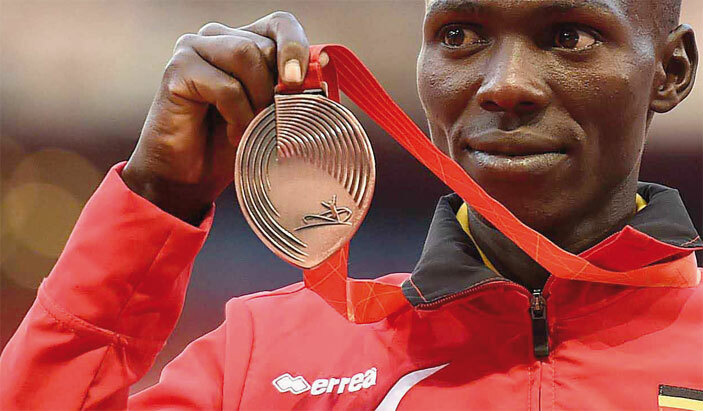  utai poses with his ronze medal during  orld hampionships e is expected to win more medals at the io lympics