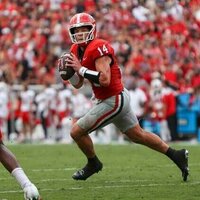 No. 4 Georgia weathers delay, downs Austin Peay