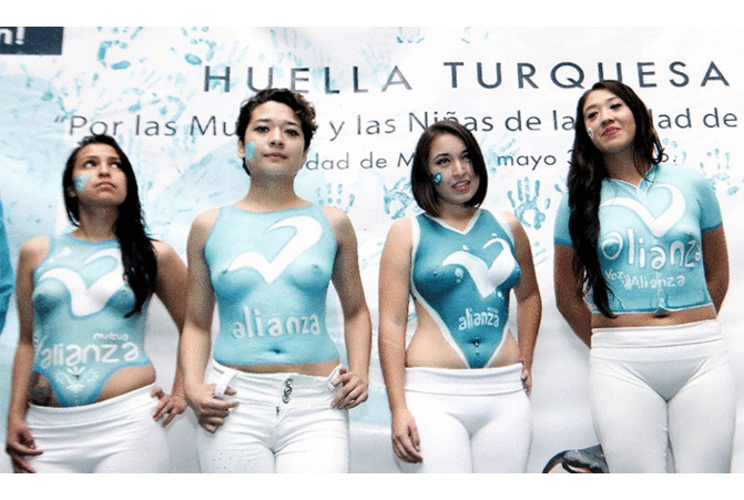 Mexican political party uses topless women in body paint Mexican political party uses topless women in body paint