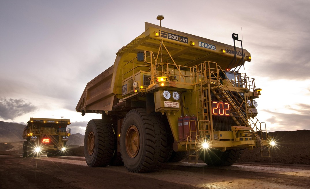 Komatsu autonomous trucks operating at a Rio Tinto mine.