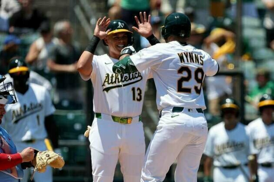 Athletics smack three HRs to take down Blue Jays