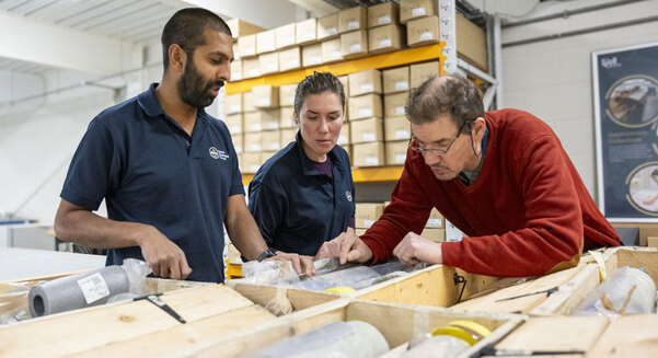BGS geologists studying the core in the National Geological Repository