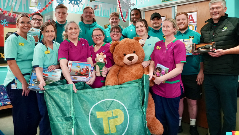 Northampton Saints and Travis Perkins deliver Christmas presents to the community