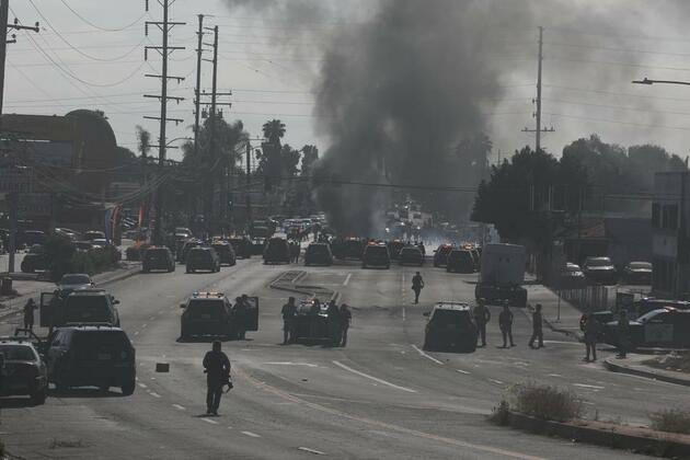 Xinhua Headlines: Immigration raids spark police-protester face-off in Los Angeles