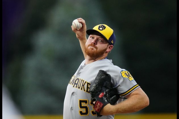 Brewers bring wild-card pursuit to Cincinnati
