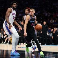 Heat use late 14-0 run to push past 76ers