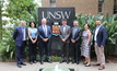 UNSW and AusIMM representatives come together at the university to sign the partnership document.