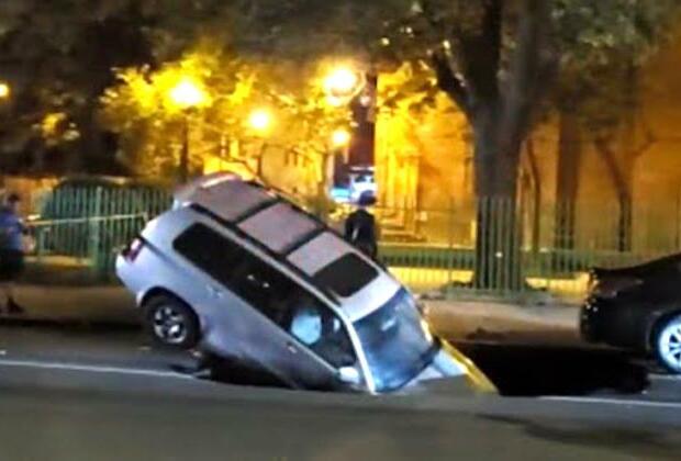 Sinkhole swallows SUV in South Korea, injuring 2 people