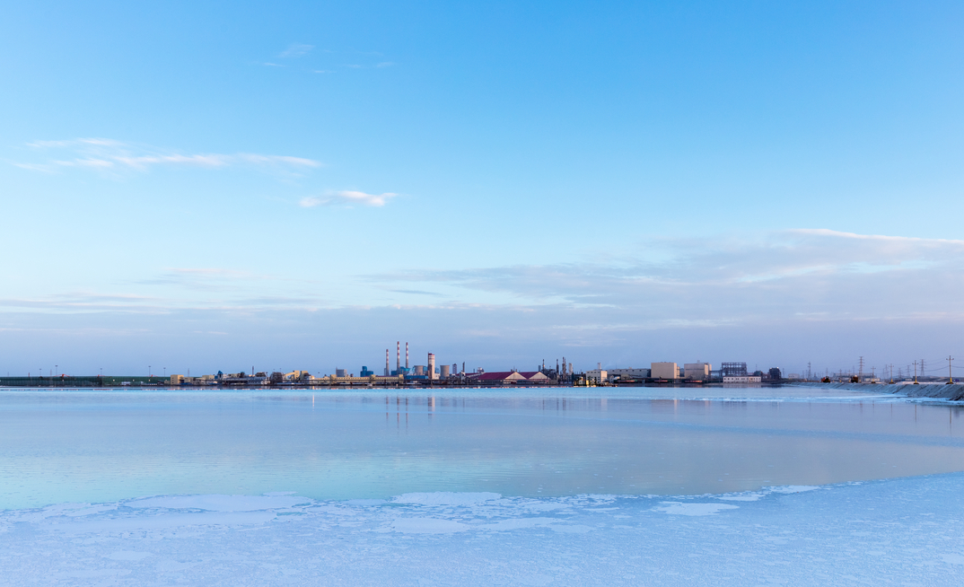 Qarhan salt lake industrial landscape, Golmud city, Qinghai province, China. Credit: Chuyuss, via Shutterstock.