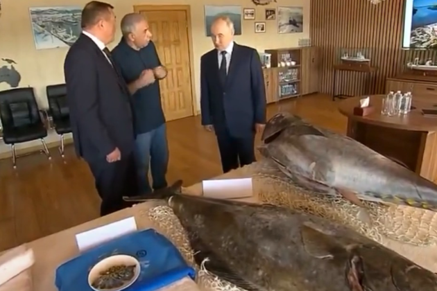 Putin visits disputed Iturup island, Japan protests