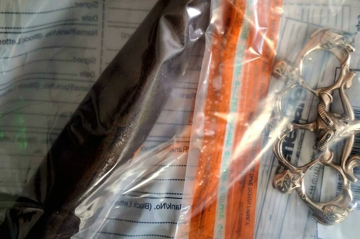 Baton, knuckle duster and class A drugs seized following car stop in West Belfast