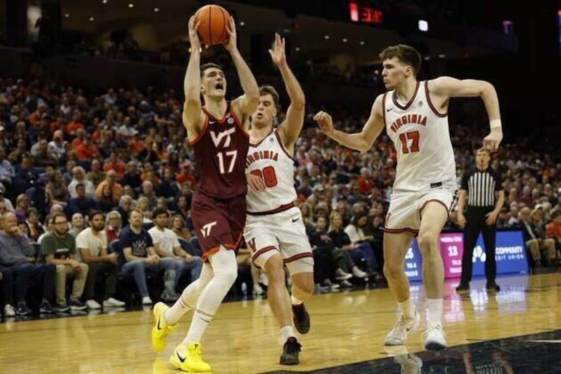No.13 Virginia gets past rival Virginia Tech