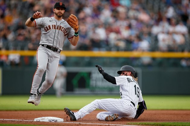 Giants sock three homers, outlast Rockies