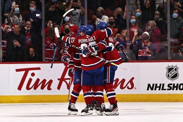 Mathieu Perrault's hat trick highlights Canadiens' first win