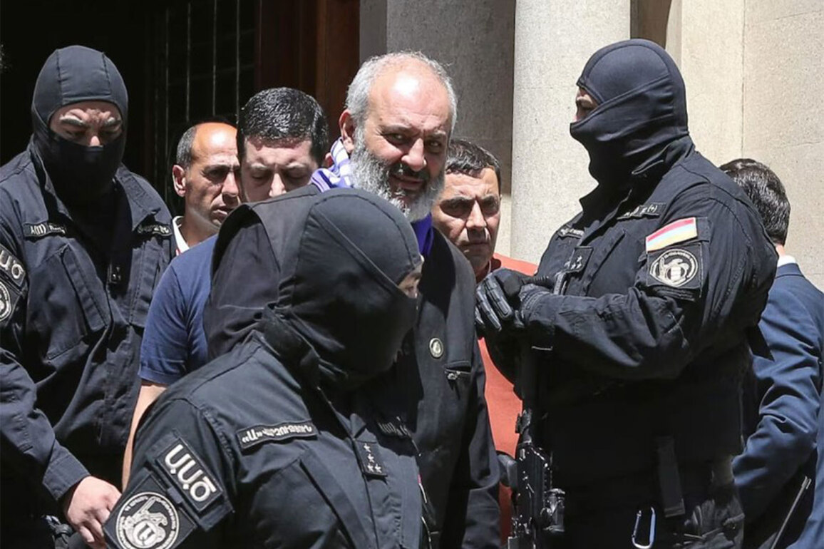 Armenian Archbishop Mikael Ajapahyan jailed for two years on coup charges amid church-government rift