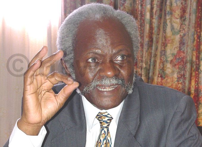 kangi speaks during an interview with unday ision at his ampala office in 2004