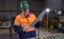 Stella Resources exploration manager Ray Hazeldene inspects a core sample from Heemskirk.