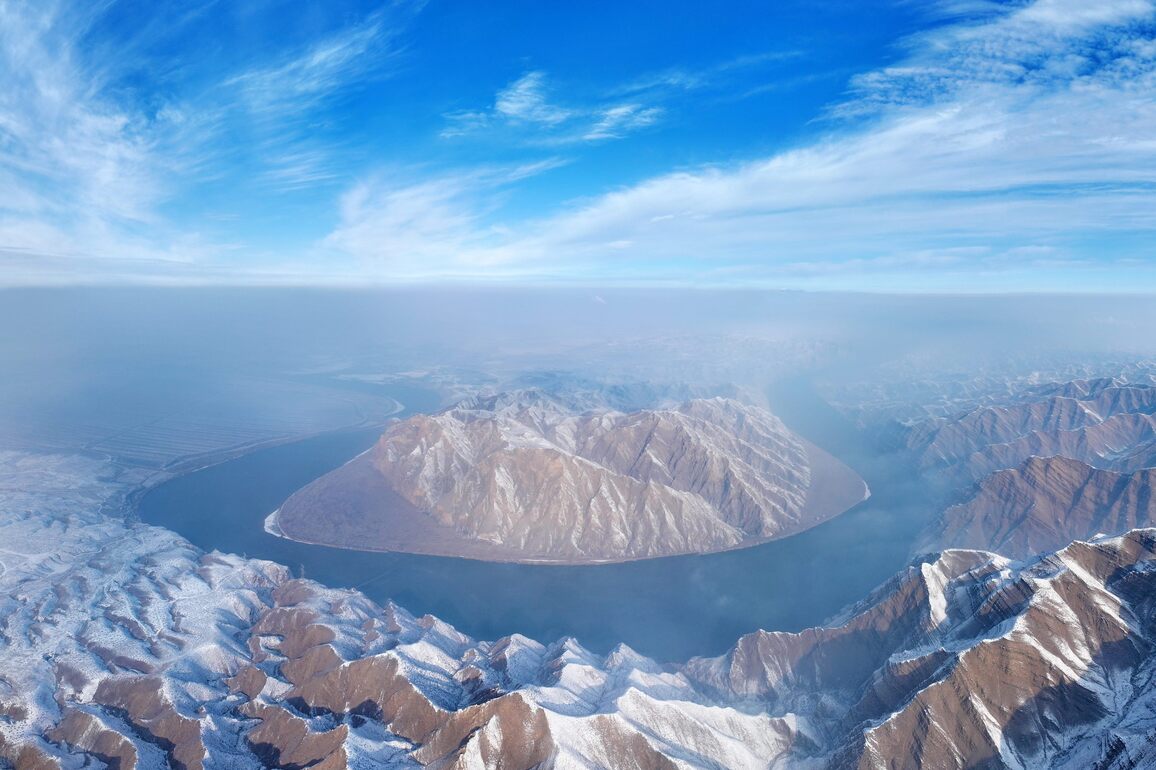 #CHINA-NINGXIA-YELLOW RIVER-SNOWFALL-SCENERY (CN)