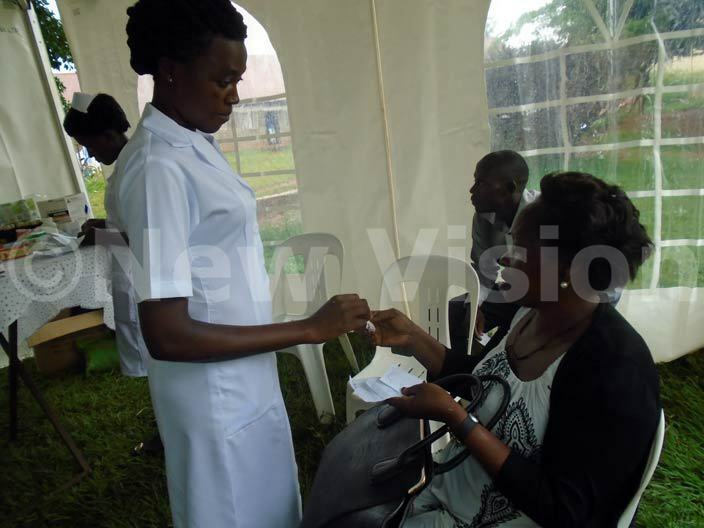   patient gets prescription at the health camp