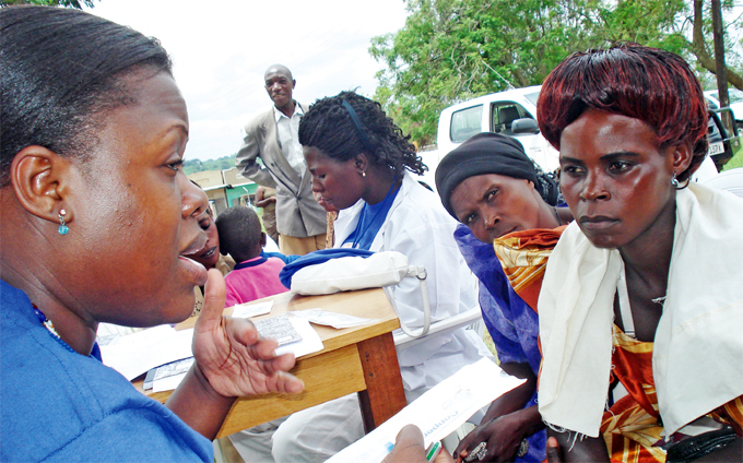 ealth workers from  sensitising women about family planning in asaka