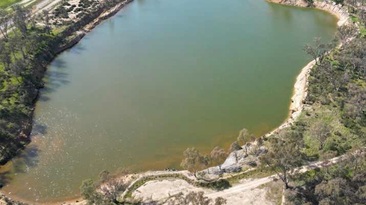 The flooded West Pit was mined in the 1990s