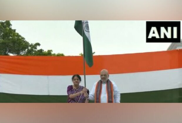 Amit Shah hoists tricolour at his residence as part of 'Har Ghar Tiranga' movement