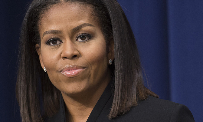 Michelle Obama brands Trump 'racist' in scalding video Michelle Obama brands Trump 'racist' in scalding video