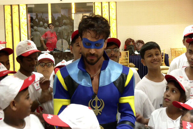 Tiger Shroff dons 'Flying Jatt' costume after almost 8 years for dance workshop with cancer-battling children in Mumbai