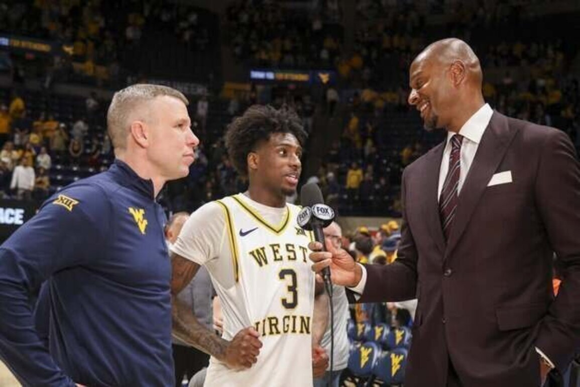 West Virginia rallies, beats Oklahoma in OT to win College Basketball Crown