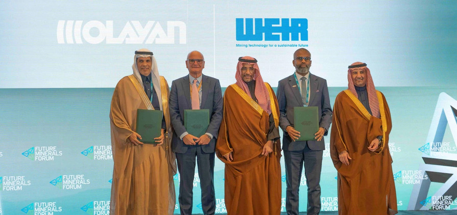 Representatives from Weir & Olayan pictured on stage at the Future Minerals Forum in Riyadh.