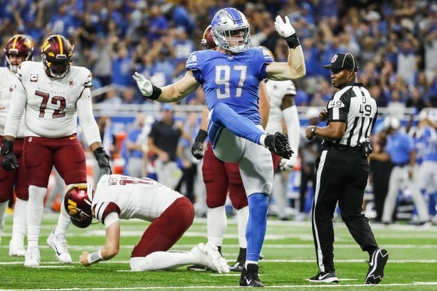 Lions DE Aidan Hutchinson (thigh) misses practice