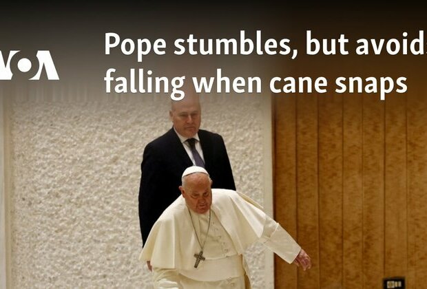 Pope stumbles, but avoids falling when cane snaps