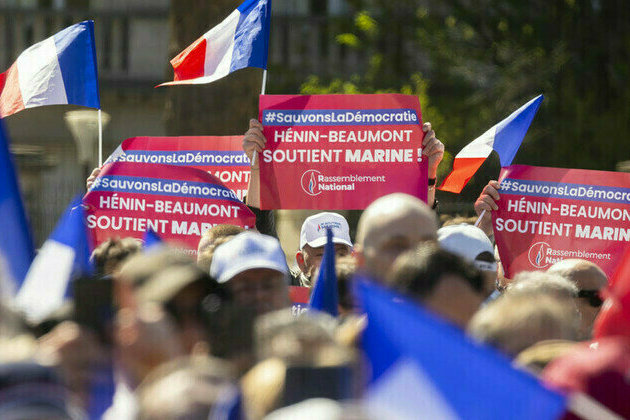Thousands join Paris rally in support of Le Pen