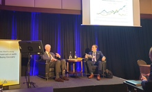 John Hathaway (left) discusses the gold market with Anthony Vaccaro, group publisher of the Northern Miner
