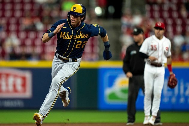 Brewers, making playoff push, go for sweep of Reds